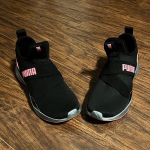 Black and pink Puma sneakers